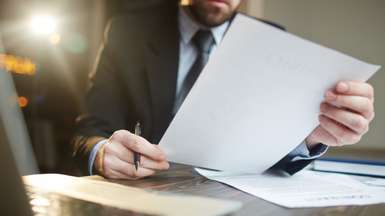 businessman-working-with-documentation-desk